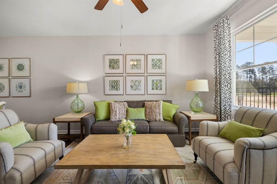 Furnished interior in a model home at Byrd Village in Graniteville (Image 5).