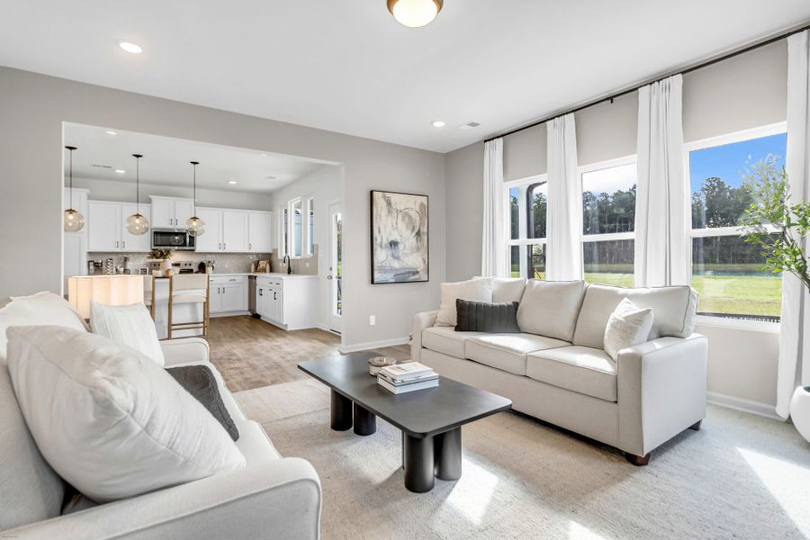 Furnished interior in a model home at Reeves Crossing in St. George (Image 8).