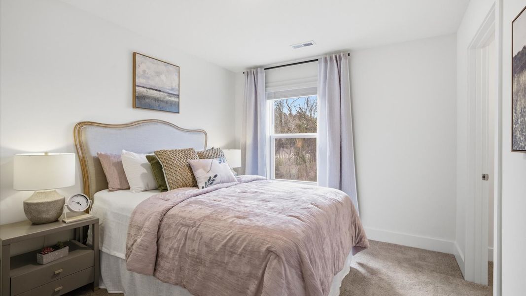 Furnished interior in a model home at Price's Point in Knoxville (Image 32).