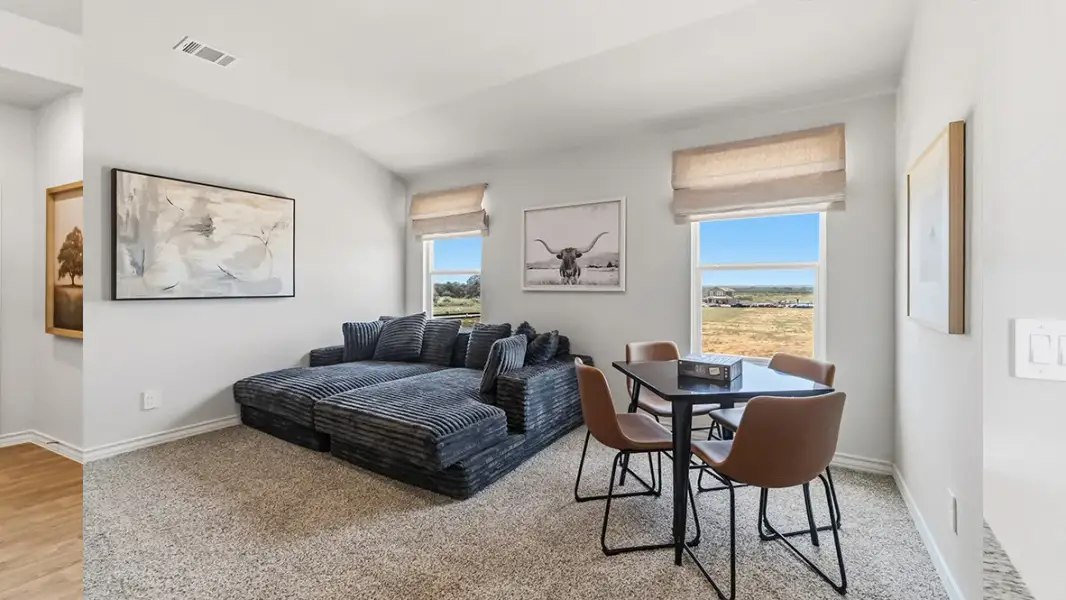Furnished interior in a model home at Saddle Ridge Estates in Lytle (Image 20).
