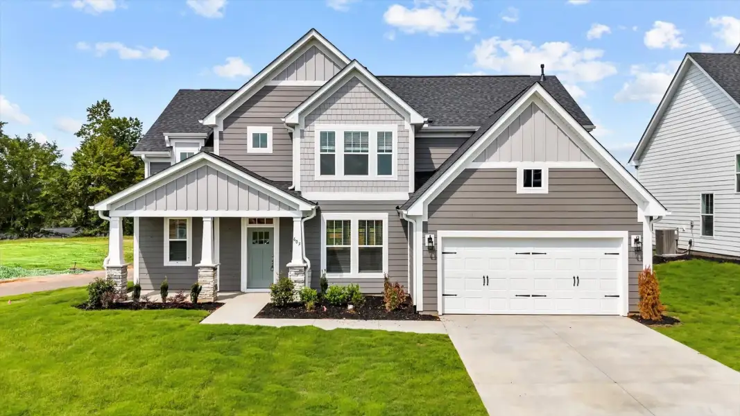 Front exterior of a home in the Woodland Summit community, located in Simpsonville, SC (Image 12).