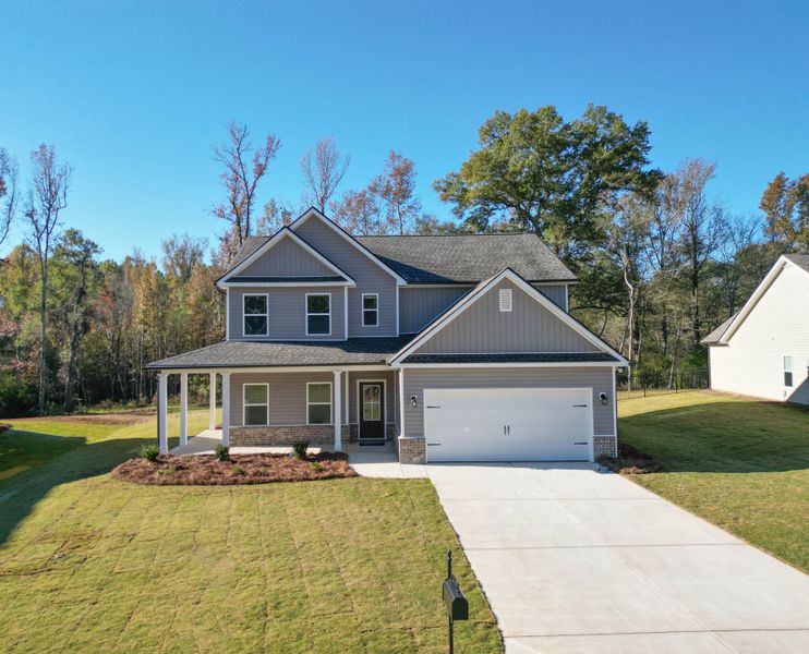 Front exterior of a home in the Harmony Farms community, located in Eatonton, GA (Image 6). Front exterior of a home in the Harmony Farms community, located in Eatonton, GA (Image 6).