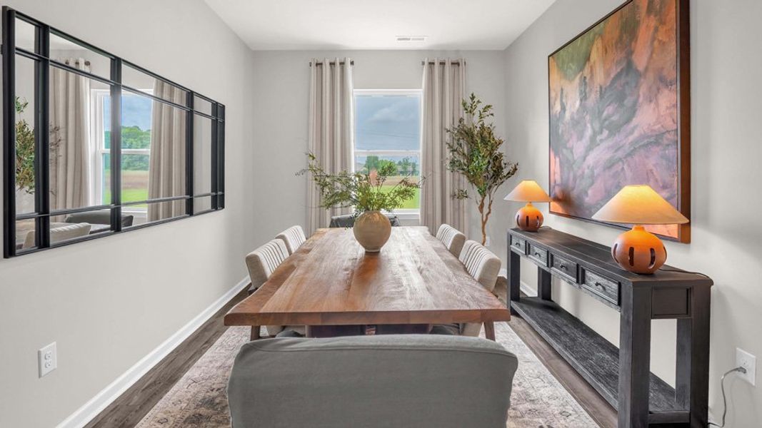 Furnished interior in a model home at Shahbain Reserve in Raeford (Image 7).