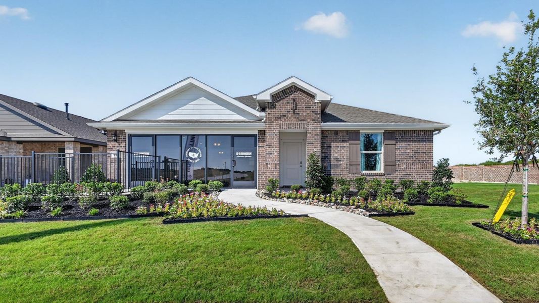 Front exterior of a home in the The Hills at Reunion community, located in Newark, TX (Image 2).