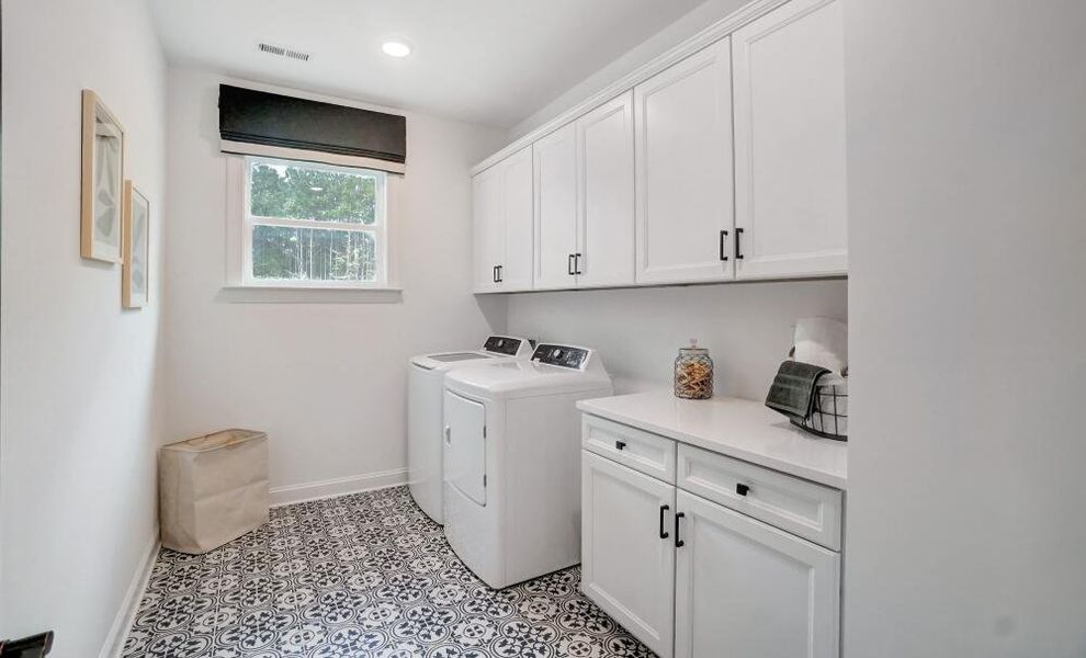 Furnished interior in a model home at Peyton's Creek in Statesville (Image 14).