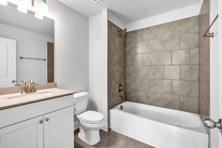 Furnished interior in a model home at The Estates at Hurricane Pointe in Douglasville (Image 47).