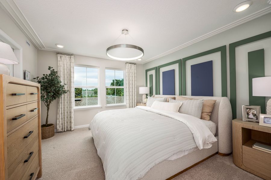 Furnished interior in a model home at Aulin Square in Oviedo (Image 12).