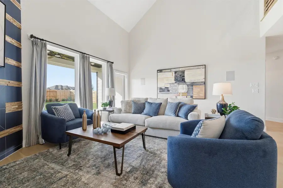 Furnished interior in a model home at Wildrye in Waller (Image 41).