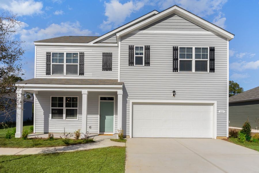 Front exterior of a home in the Island Green community, located in Myrtle Beach, SC (Image 2).