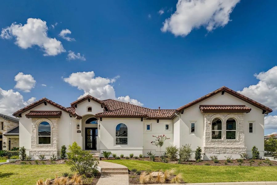 Front exterior of a home in the Andalucia At The Dominion community, located in Shavano Park, TX (Image 4).