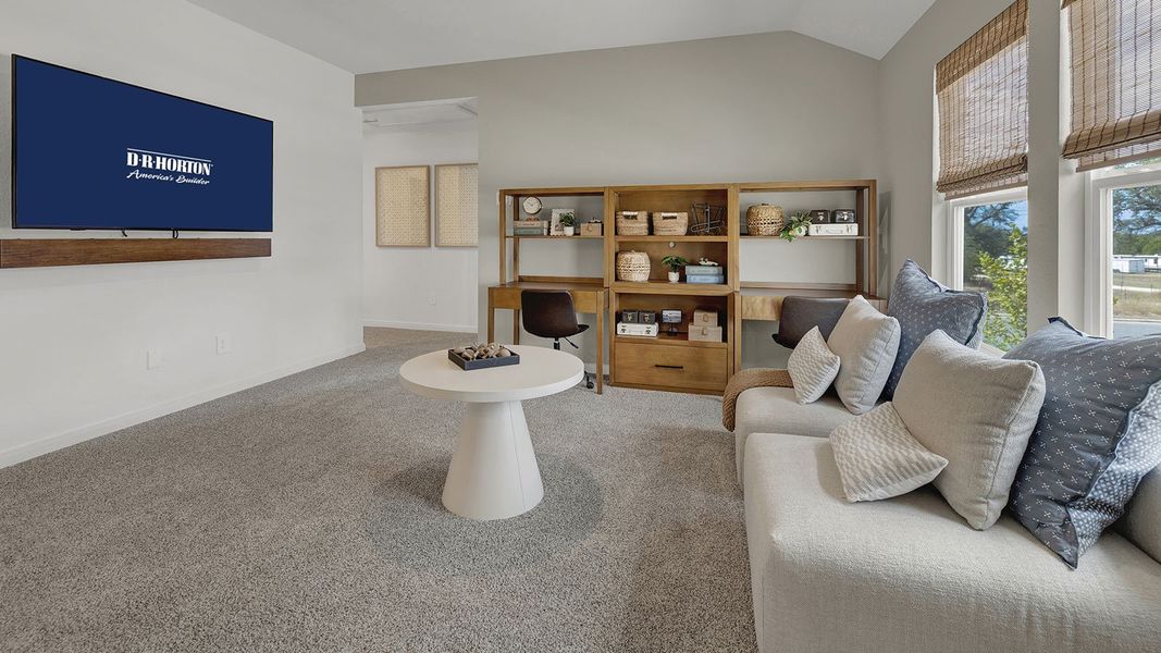 Furnished interior in a model home at Paramount in Kyle (Image 23).