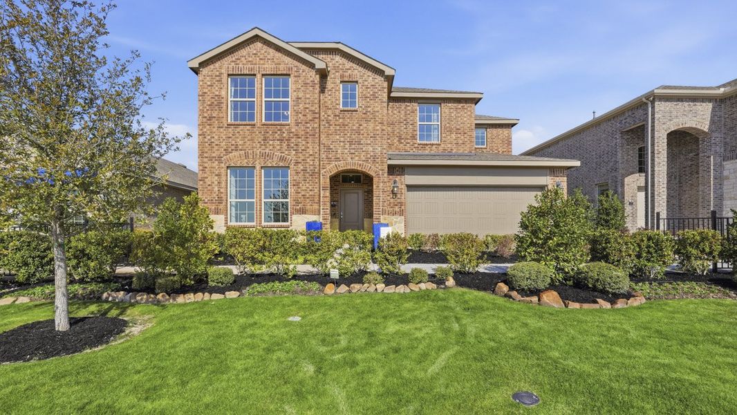 Front exterior of a home in the The Woods at Lindsey Place community, located in Anna, TX (Image 18).