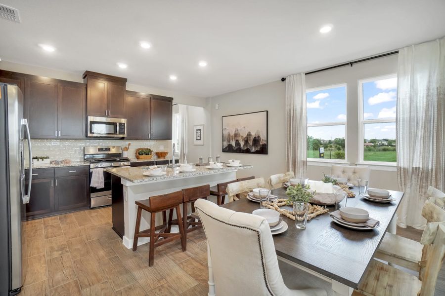 Furnished interior in a model home at Blue Ridge Ranch in San Antonio (Image 19).