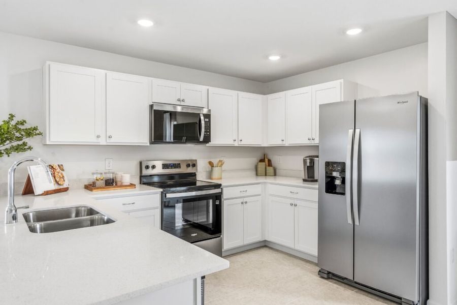Furnished interior in a model home at Citrus Ridge in Lake Wales (Image 5).