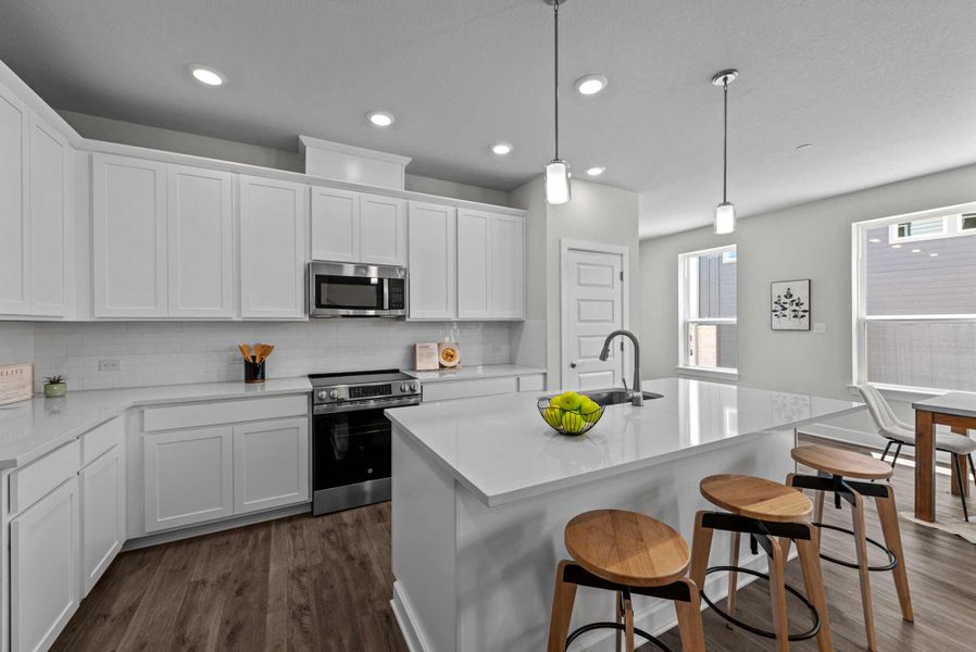 Furnished interior in a model home at Double Creek Crossing Townhomes in Round Rock (Image 7).