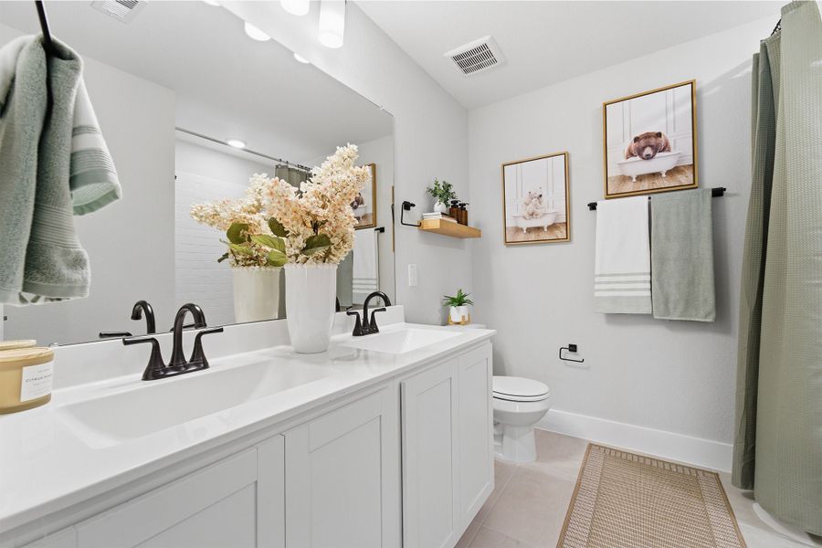 Furnished interior in a model home at Trails at Woodhaven Lakes in La Marque (Image 42).