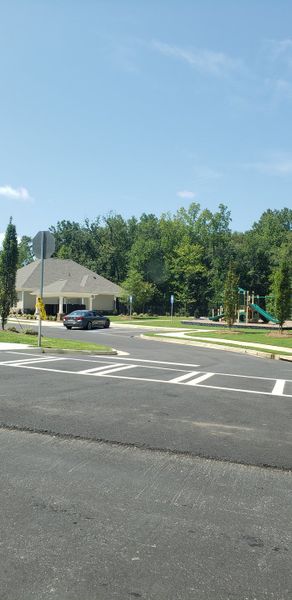 Community amenities with a playground nestled in Butner Estates by D.R. Horton in South Fulton, GA.