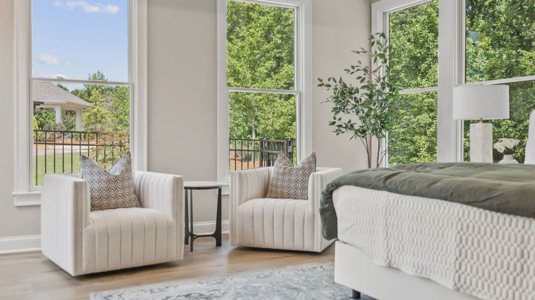 Furnished interior in a model home at The Courtyards at Post Road in Cumming (Image 19).