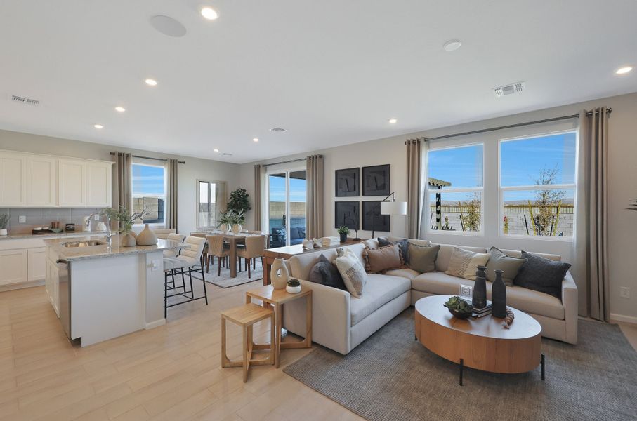 A large living room with a large window. A large living room with a large window.