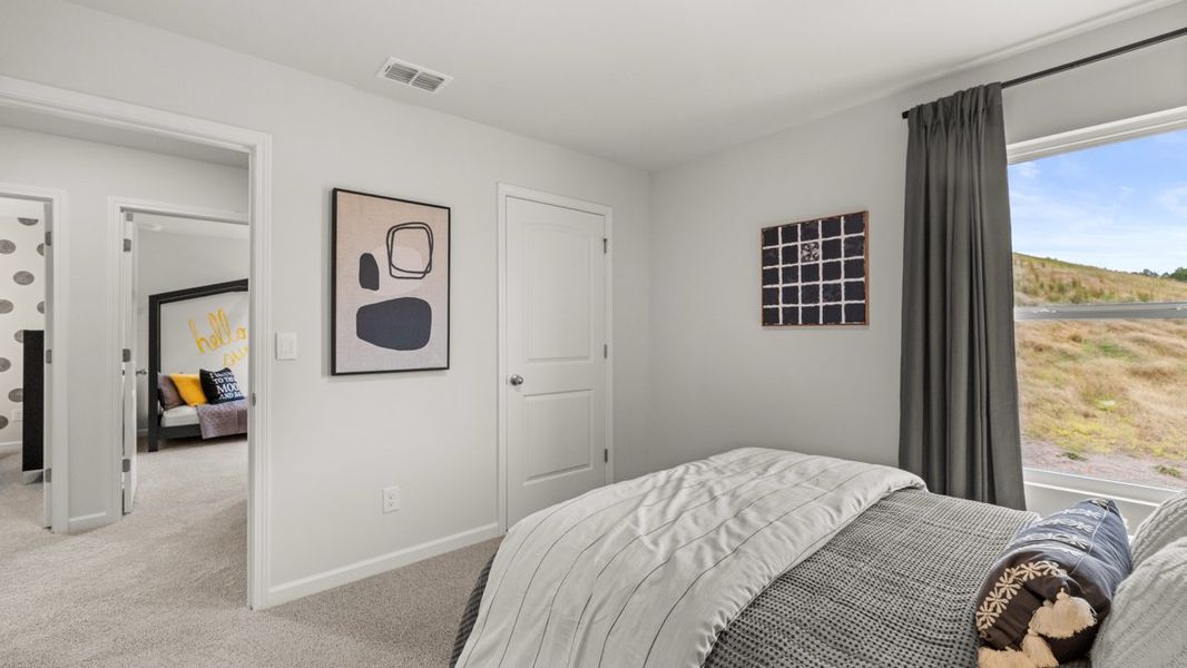 Furnished interior in a model home at Sheffield Highlands in Dallas (Image 43).