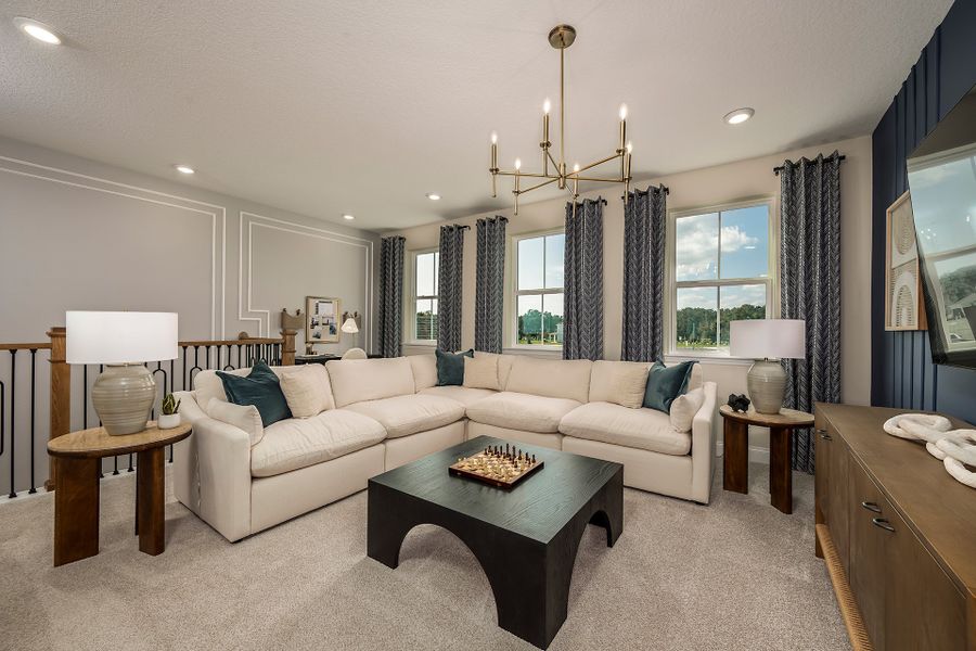 Furnished interior in a model home at Estates at Lake Jesup in Sanford (Image 7).