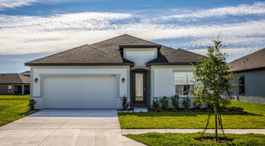 Front exterior of a home in the Villa Pass community, located in Groveland, FL (Image 3).
