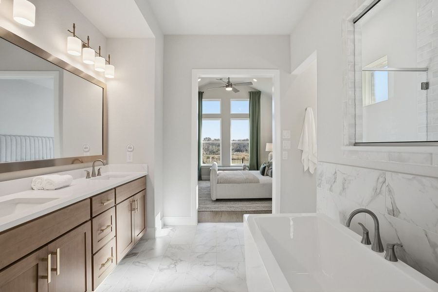 Furnished interior in a model home at Lily Creek at Sutton Fields in Aubrey (Image 56).