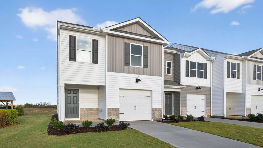 Front exterior of a home in the The Townes at Honeycutt Oaks community, located in Angier, NC (Image 14).