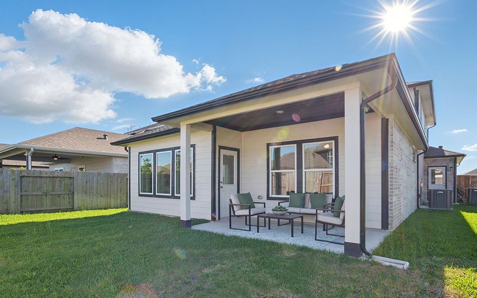 Front exterior of a home in the Windrose Green community, located in Angleton, TX (Image 11).