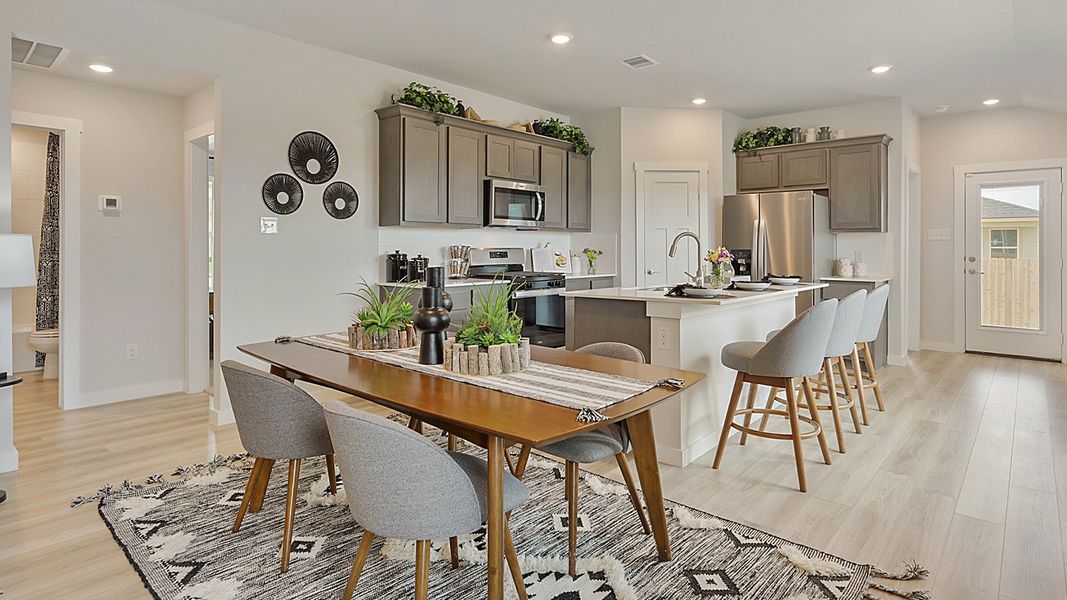 Furnished interior in a model home at Midtown Reserve in College Station (Image 7).