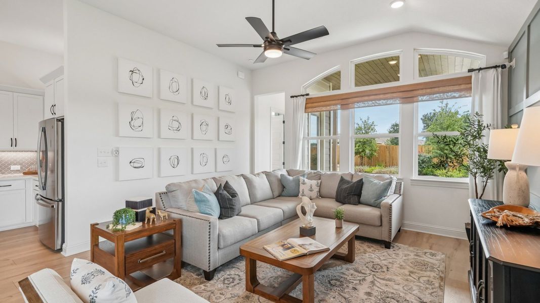 Open and airy great room seamlessly flowing into the dining area and kitchen with abundant natural light Open and airy great room seamlessly flowing into the dining area and kitchen with abundant natural light