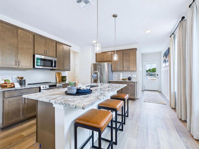 Furnished interior in a model home at Cedar Heights in San Antonio (Image 5).