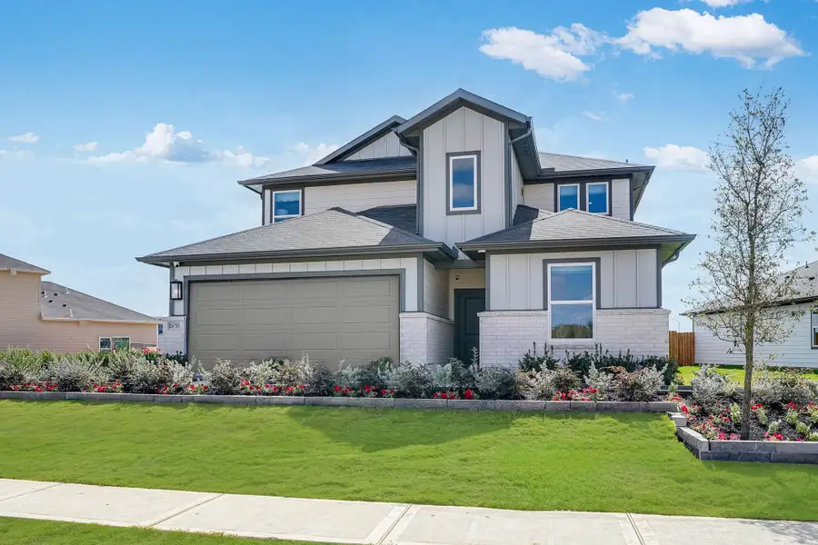 Front exterior of a home in the Hockley Meadows 45s community, located in Hockley, TX (Image 1).