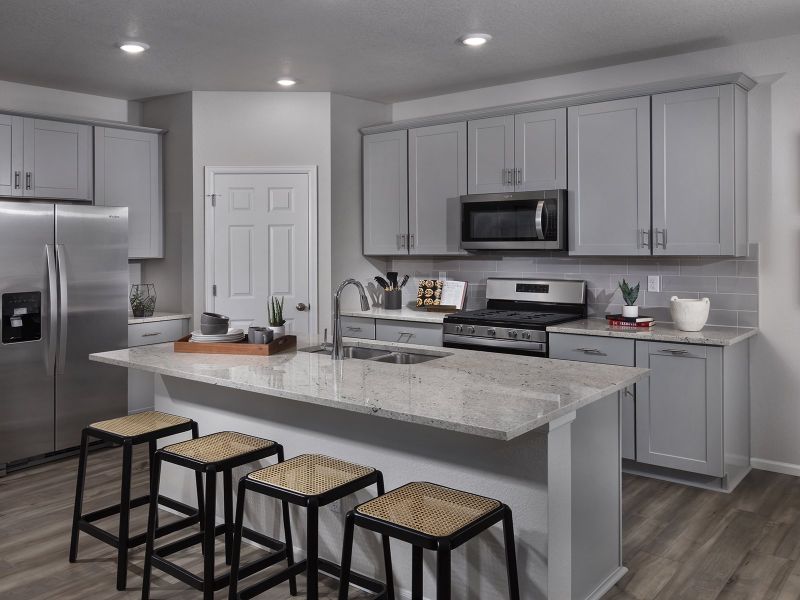 Furnished interior in a model home at Buffalo Highlands: The Flora Collection in Commerce City (Image 3). Furnished interior in a model home at Buffalo Highlands: The Flora Collection in Commerce City (Image 3).