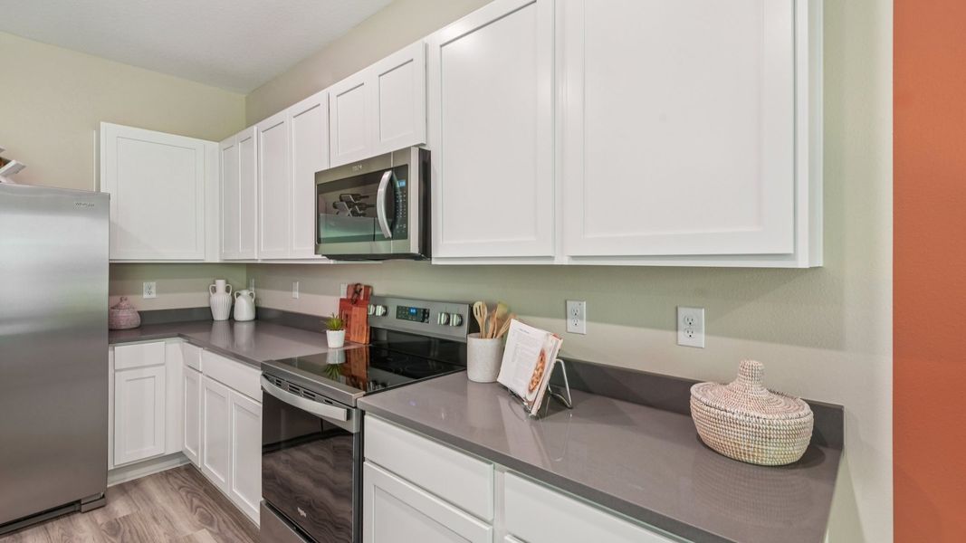 Furnished interior in a model home at Sanctuary at Citrus Park in Tampa (Image 5).