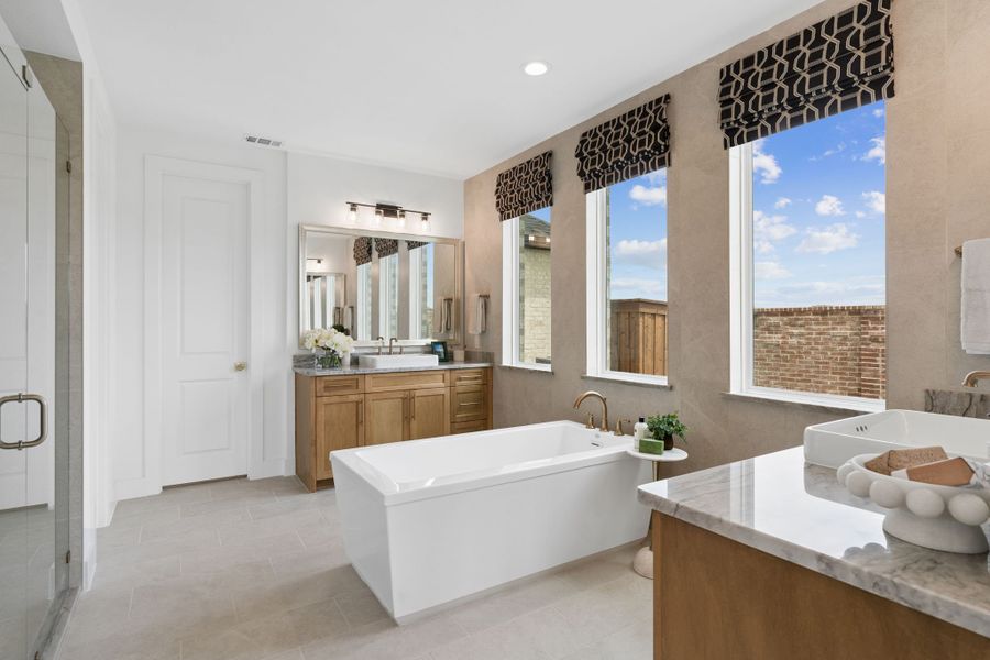 Furnished interior in a model home at Sweetgrass 65s in Haslet (Image 28).