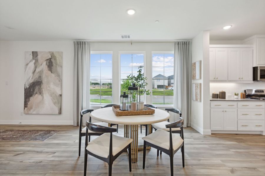 Furnished interior in a model home at Twin Creeks Watters in Allen (Image 15).