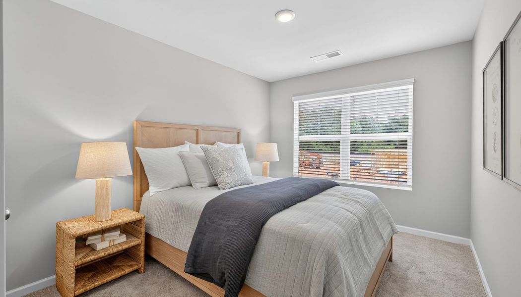 Furnished interior in a model home at The Reserve at Clocktower in Douglasville (Image 22).