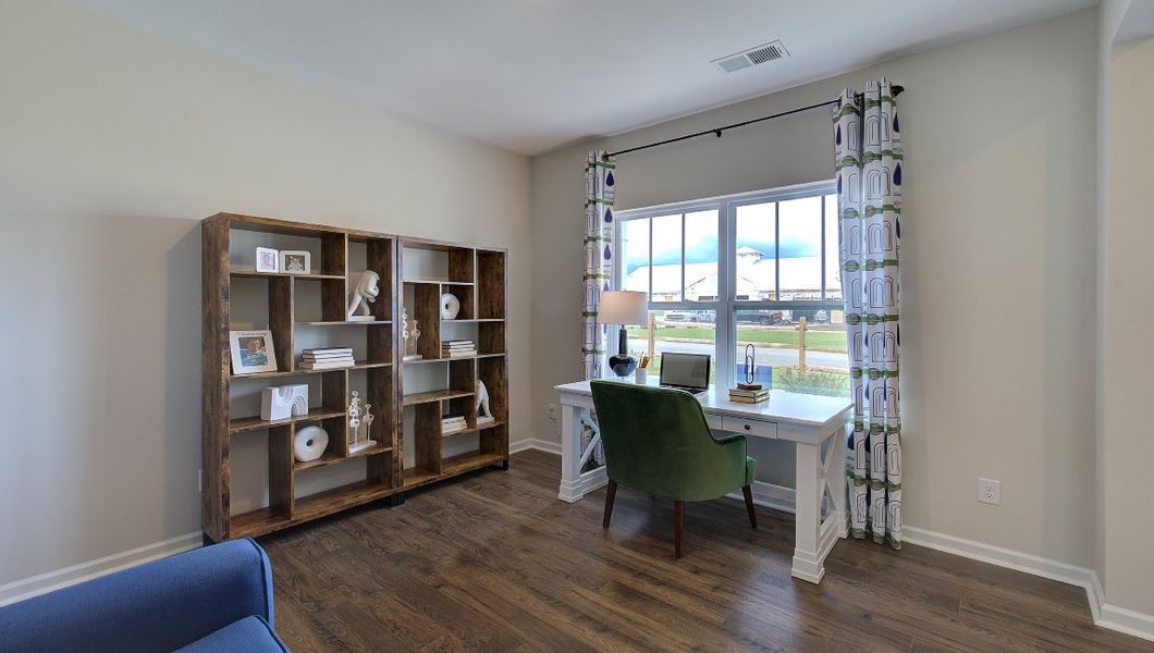 Furnished interior in a model home at Tap Root Farms in Fletcher (Image 34).