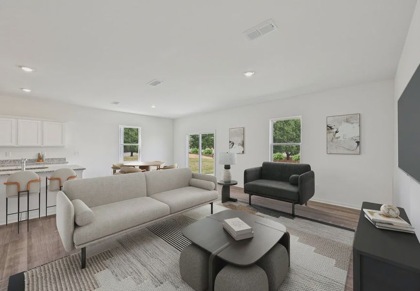 Furnished interior in a model home at The Point in Rolesville (Image 6).