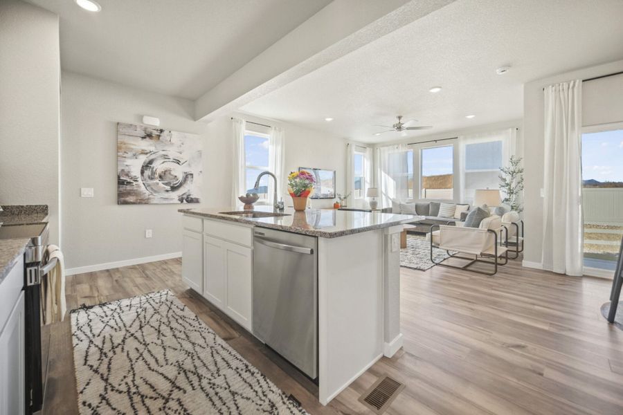 Furnished interior in a model home at Aspen Meadows – Townhomes in Colorado Springs (Image 6). Furnished interior in a model home at Aspen Meadows – Townhomes in Colorado Springs (Image 6).