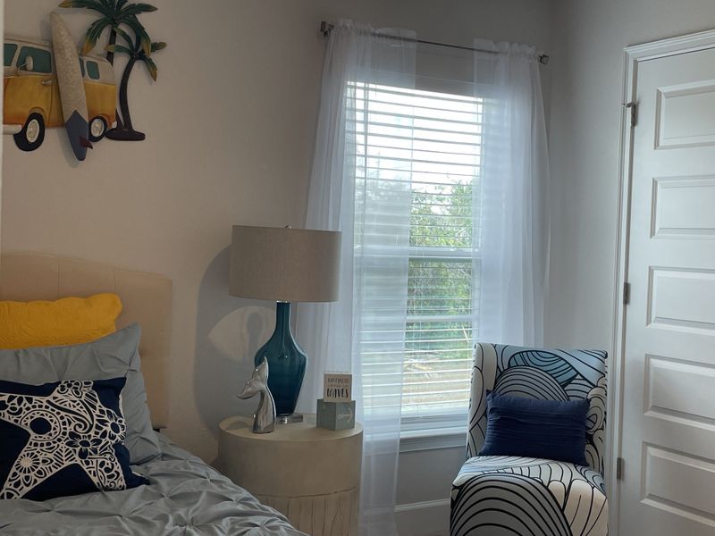 Furnished interior in a model home at Watercress Cove in North Port (Image 7).