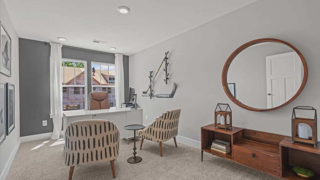 Carpeted secondary bedroom at Tyger Ridge by DRB Homes in Spartanburg, SC Carpeted secondary bedroom at Tyger Ridge by DRB Homes in Spartanburg, SC