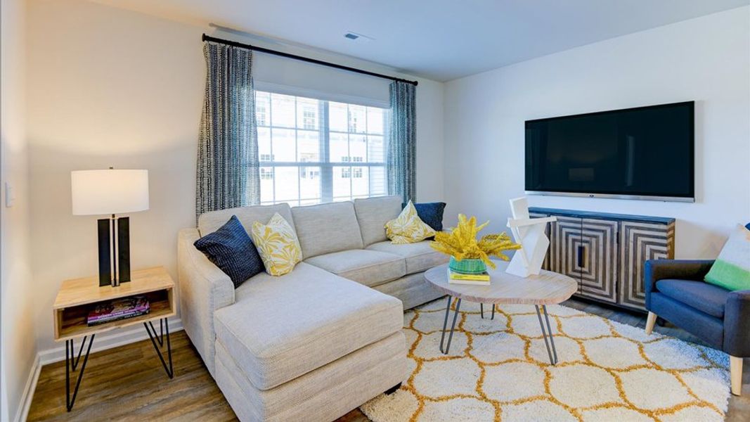 Furnished interior in a model home at Edinborough Townes in Gibsonville (Image 12).