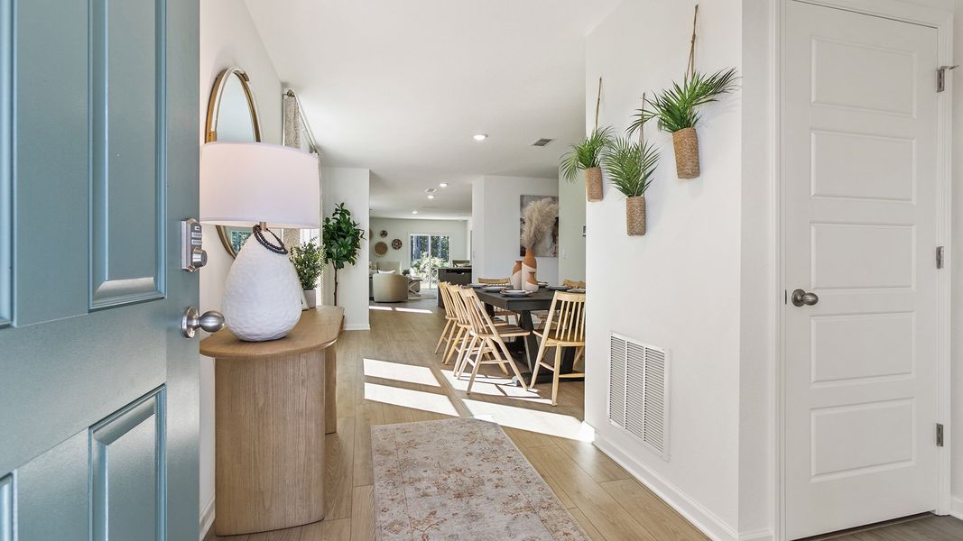 Furnished interior in a model home at Copes Landing in Jacksonville (Image 48).