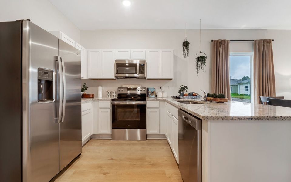 Furnished interior in a model home at Stonehenge in Manchester (Image 5).