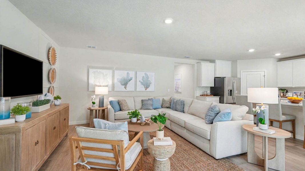 Furnished interior in a model home at Indian River Preserve in Mims (Image 14).