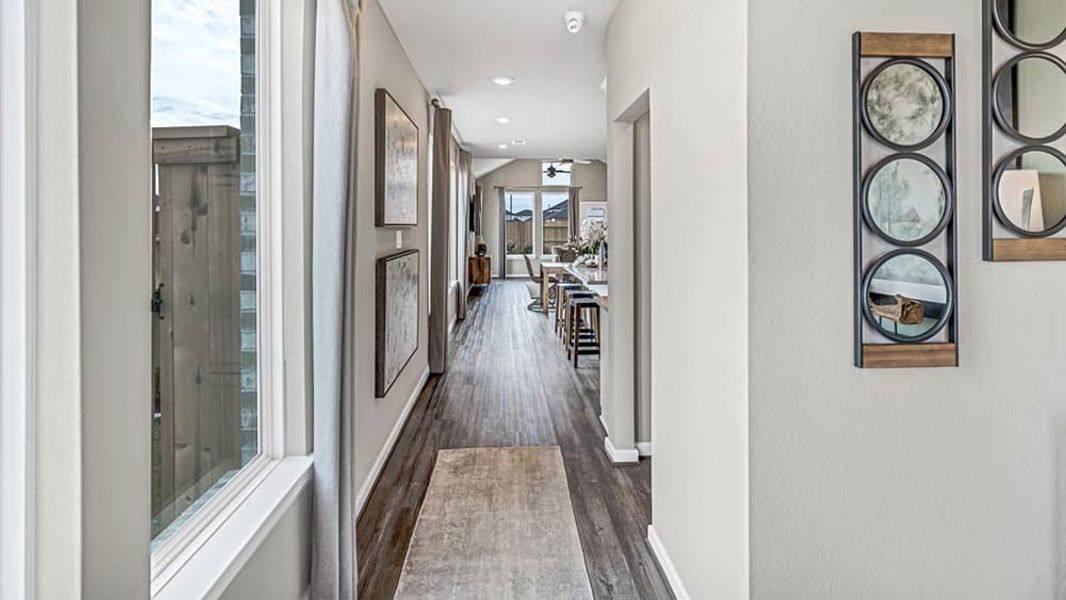 Furnished interior in a model home at Avalon at Cypress in Cypress (Image 7).