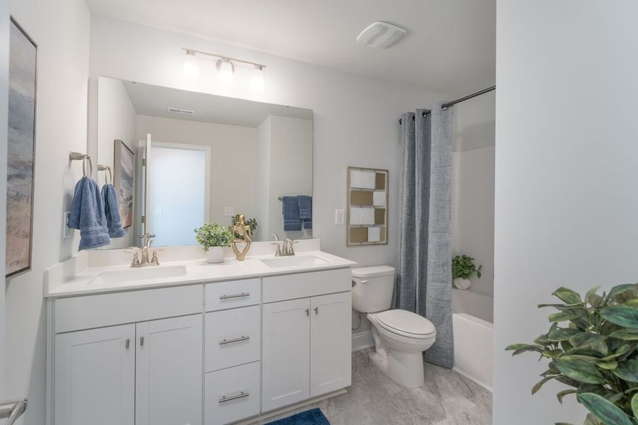 Furnished interior in a model home at Pine Trace in Gastonia (Image 12).