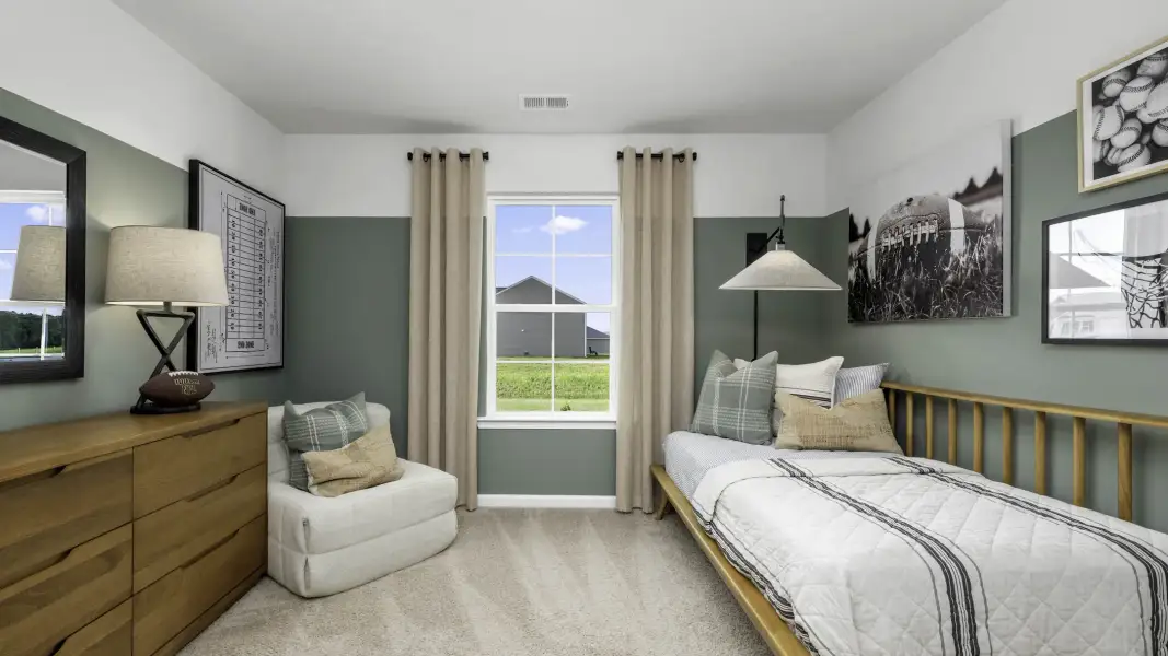 Furnished interior in a model home at Parker Trace in Mocksville (Image 7).
